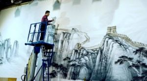 为中央团校添彩 艺术家郭杭建奋笔挥毫 ---巨幅国画《万里长城 江山永固》创作记实